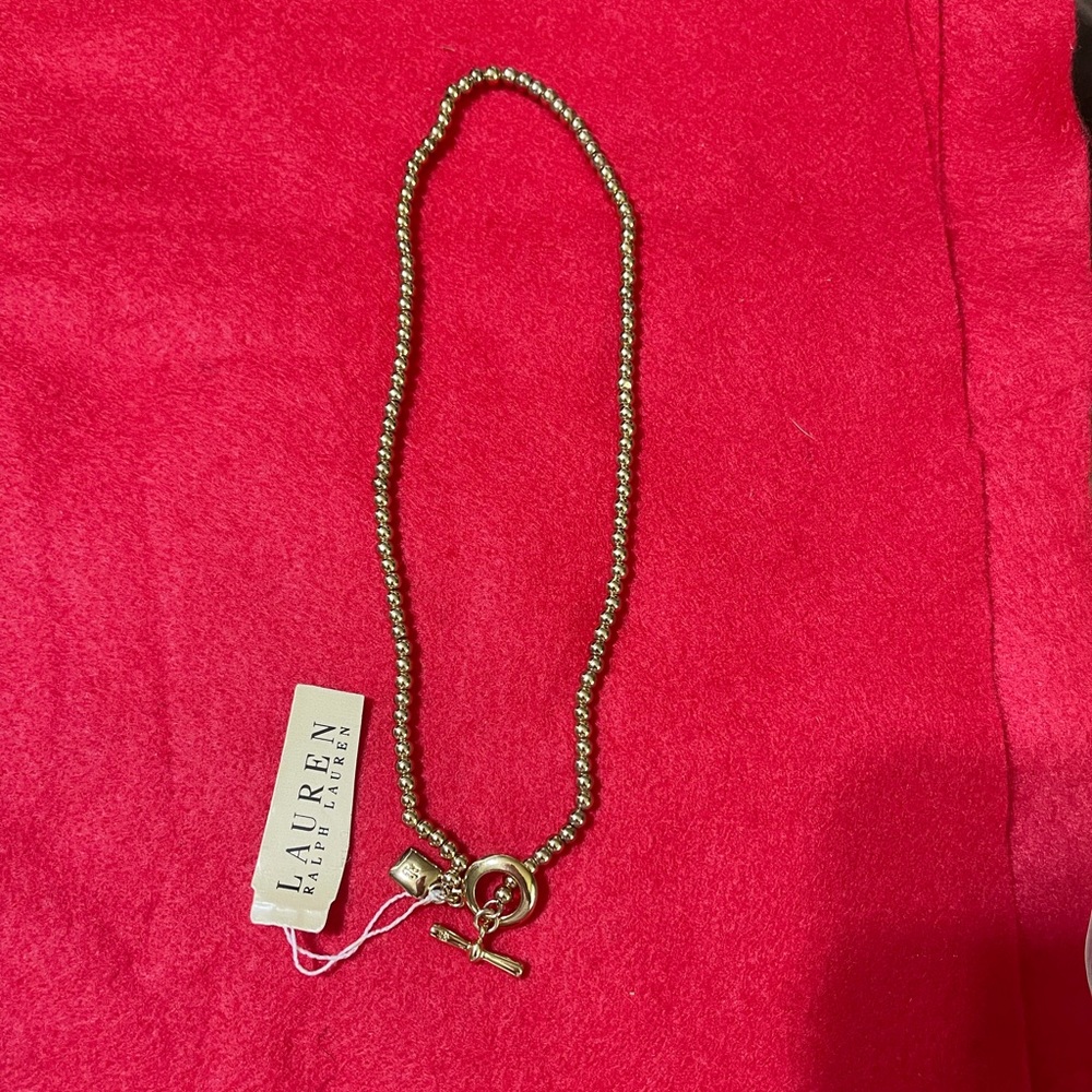 Ralph Lauren Gold Tone Beads & Padlock Toggle Necklace. NWT